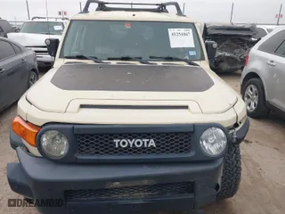 2010 Toyota FJ Cruiser with VIN JTEBU4BF2AK073829, listed as a IAAI auction lot 41254467 with 140,787 mi miles. Bid and sale history available at carsss.com. Image 12.