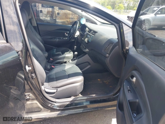 2016 Kia Rio EX with VIN KNADN4A34G6575984, listed as a IAAI auction lot 42133630 with 126,704 mi miles. Bid and sale history available at carsss.com. Image 5.
