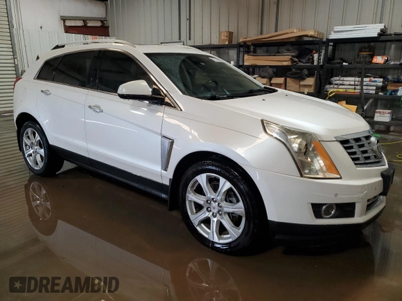 2015 Cadillac SRX Performance Collection with VIN 3GYFNCE36FS531134, listed as a Copart auction lot 54862205 with 103,051 mi miles and Clean title. Bid and sale history available at DreamBid. Image 4.