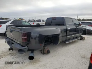 2015 GMC Sierra 3500HD Denali z VIN 1GT424E80FF657761, wystawiony jako Copart lot #75131604 z przebiegiem 78 011 mil mil oraz Nie do naprawy. Historia ofert i sprzedaży dostępna na DreamBid. Obrazek 3.