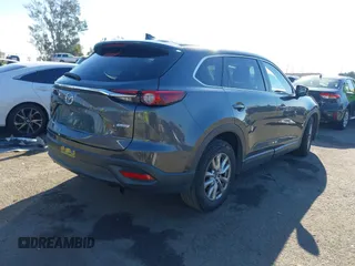 2017 Mazda CX-9 Sport with VIN JM3TCABY4H0128483, listed as a IAAI auction lot 41299667 with 142,343 mi miles and . Bid and sale history available at DreamBid. Image 4.