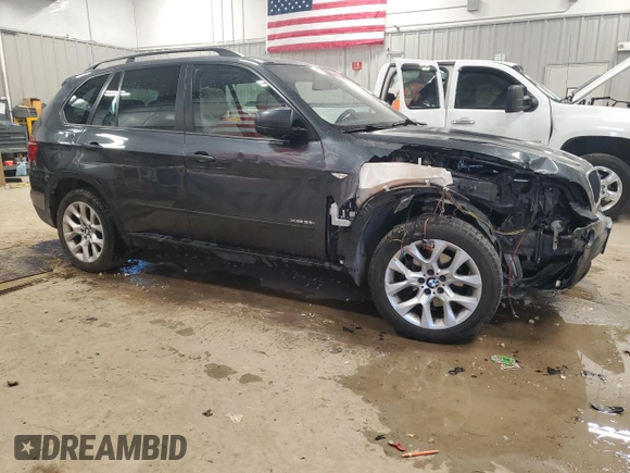 2012 BMW X5 35i с VIN 5UXZV4C55CL750678, выставлен на аукционе Copart как лот 52995185 с пробегом 130 912 миль миль и Чистый • Clean title. История ставок и продаж доступна на DreamBid. Изображение 4.
