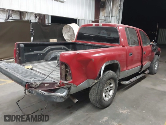 2001 Dodge Dakota Sport with VIN 1B7HL2AN81S296293, listed as a IAAI auction lot 41470036 with 203,323 mi miles. Bid and sale history available at carsss.com. Image 4.