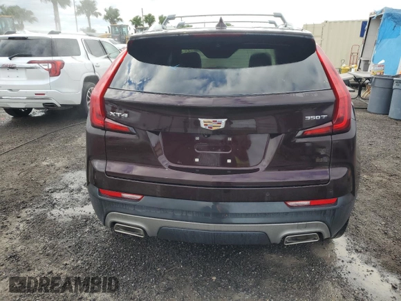 2021 Cadillac XT4 FWD Premium Luxury z VIN 1GYFZCR45MF080027, wystawiony jako Copart lot #46195835 z przebiegiem Nie podano mil oraz Nie do naprawy • Non repairable. Historia ofert i sprzedaży dostępna na DreamBid. Obrazek 6.