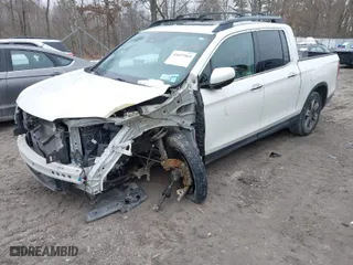 2019 Honda Ridgeline RTL-E with VIN 5FPYK3F77KB007879, listed as a IAAI auction lot 41697569 with 80,215 mi miles. Bid and sale history available at carsss.com. Image 2.