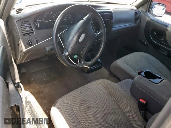 2001 Ford Ranger XL with VIN 1FTYR14V01PB46542, listed as a Copart auction lot 60977205 with 230,933 mi miles and Salvage title. Bid and sale history available at DreamBid. Image 8.