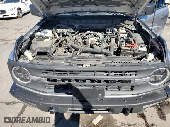 2023 Ford Bronco z VIN 1FMDE5CP7PLB26062, wystawiony jako Copart lot #76208154 z przebiegiem 17 688 mil mil oraz Szkoda całkowita • Salvage title. Historia ofert i sprzedaży dostępna na DreamBid. Obrazek 12.
