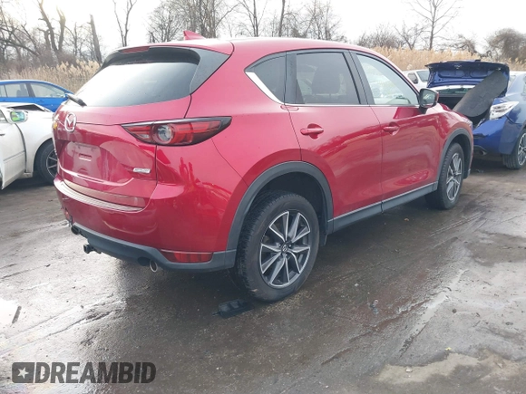 2018 Mazda CX-5 Grand Touring with VIN JM3KFBDM8J0406276, listed as a IAAI auction lot 41447355 with 70,772 mi miles. Bid and sale history available at carsss.com. Image 4.