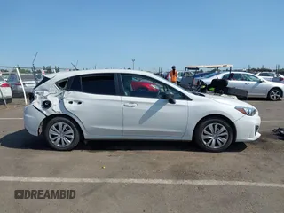 2018 Subaru Impreza with VIN 4S3GTAA64J3717886, listed as a IAAI auction lot 42572412 with 91,911 mi miles and . Bid and sale history available at DreamBid. Image 13.