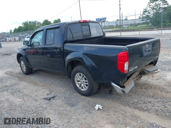 2015 Nissan Frontier S with VIN 1N6AD0EV2FN735908, listed as a IAAI auction lot 42388456 with 164,889 mi miles and . Bid and sale history available at DreamBid. Image 3.