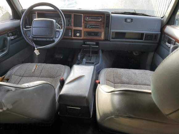 1996 Jeep Cherokee Country with VIN 1J4FJ78S9TL252803, listed as a Copart auction lot 49278184 with 180,420 mi miles and Clean Title. Bid and sale history available at carsss.com. Image 8.