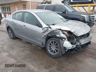 2010 Mazda 3 i Sport z VIN JM1BL1SF8A1310772, wystawiony jako IAAI lot #42307449 z przebiegiem 168 905 mil mil oraz . Historia ofert i sprzedaży dostępna na DreamBid. Obrazek 1.
