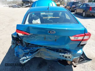 2019 Subaru Impreza z VIN 4S3GKAA61K3606040, wystawiony jako IAAI lot #41994415 z przebiegiem 89 780 mil mil oraz . Historia ofert i sprzedaży dostępna na DreamBid. Obrazek 16.