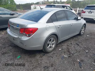 2014 Chevrolet Cruze 1LT with VIN 1G1PC5SB5E7403383, listed as a IAAI auction lot 41960344 with 141,586 mi miles and . Bid and sale history available at DreamBid. Image 4.