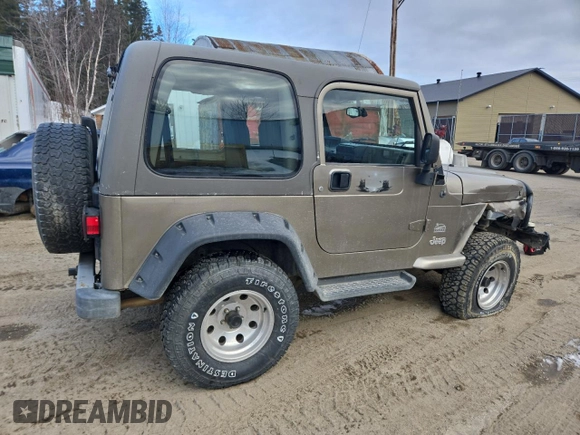 2004 Jeep Wrangler Sahara with VIN 1J4FA59S64P774768, listed as a Copart auction lot 49868895 with 120,800 mi miles and Salvage Title. Bid and sale history available at DreamBid. Image 3.