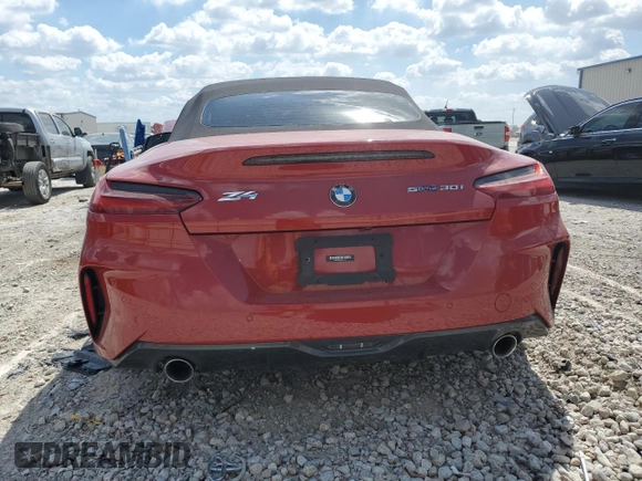 2021 BMW Z4 sDrive30i with VIN WBAHF3C07MWX23567, listed as a Copart auction lot 71971044 with 0 mi miles and Salvage Title. Bid and sale history available at carsss.com. Image 6.