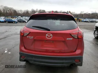 2015 Mazda CX-5 Grand Touring with VIN JM3KE4DY3F0510425, listed as a Copart auction lot 51784295 with 138,147 mi miles and Clean Title. Bid and sale history available at carsss.com. Image 6.