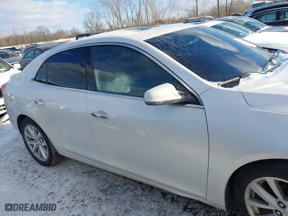 2015 Chevrolet Malibu LTZ with VIN 1G11F5SL5FF237461, listed as a IAAI auction lot 41579154 with 103,670 mi miles. Bid and sale history available at carsss.com. Image 14.