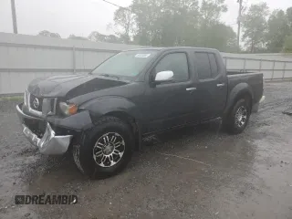 2010 Nissan Frontier SE with VIN 1N6AD0EV5AC407533, listed as a Copart auction lot 52020365 with 119,041 mi miles and Salvage title. Bid and sale history available at DreamBid. Image 1.