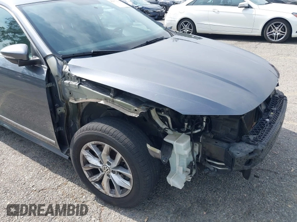 2016 Volkswagen Passat S with VIN 1VWAT7A36GC031403, listed as a IAAI auction lot 42371103 with 86,454 mi miles and . Bid and sale history available at DreamBid. Image 6.