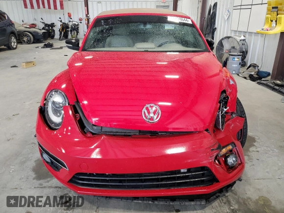 2015 Volkswagen Beetle with VIN 3VW7S7AT1FM822318, listed as a Copart auction lot 71398644 with 73,421 mi miles and Salvage Title. Bid and sale history available at DreamBid. Image 5.