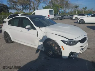 2018 BMW M3 with VIN WBS8M9C59J5J78148, listed as a IAAI auction lot 41463197 with 102,669 mi miles. Bid and sale history available at carsss.com. Image 1.