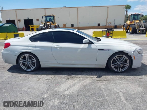 2014 BMW 6 Series 650i with VIN WBAYM9C55ED248244, listed as a IAAI auction lot 42043456 with 144,664 mi miles and . Bid and sale history available at DreamBid. Image 13.