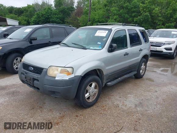 2003 Ford Escape XLS Popular with VIN 1FMYU02123KA32790, listed as a IAAI auction lot 42122524 with 244,560 mi miles and . Bid and sale history available at DreamBid. Image 2.