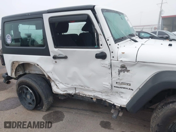 2013 Jeep Wrangler Sport z VIN 1C4AJWAG9DL653348, wystawiony jako IAAI lot #42096860 z przebiegiem 55 575 mil mil oraz . Historia ofert i sprzedaży dostępna na DreamBid. Obrazek 6.