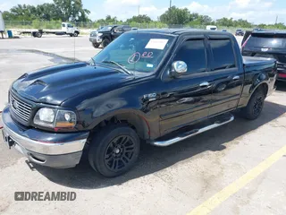 2003 Ford F-150 XLT with VIN 1FTRW07673KD87283, listed as a IAAI auction lot 42687687 with 339,160 mi miles and . Bid and sale history available at DreamBid. Image 2.