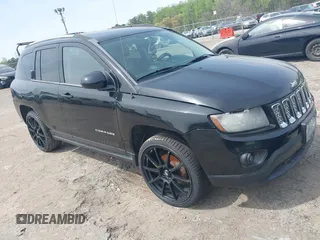 2014 Jeep Compass Latitude with VIN 1C4NJDEB9ED646139, listed as a IAAI auction lot 41942938 with 270,510 mi miles. Bid and sale history available at carsss.com. Image 1.
