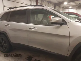 2019 Jeep Cherokee Latitude Plus with VIN 1C4PJMLX2KD427395, listed as a IAAI auction lot 41586532 with 84,033 mi miles and . Bid and sale history available at DreamBid. Image 14.