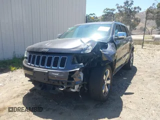 2015 Jeep Grand Cherokee Overland with VIN 1C4RJFCG7FC839778, listed as a IAAI auction lot 42490111 with 160,040 mi miles and . Bid and sale history available at DreamBid. Image 2.