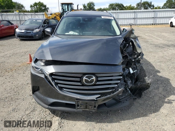 2019 Mazda CX-9 Touring with VIN JM3TCBCY0K0309947, listed as a Copart auction lot 56897815 with 87,517 mi miles and Salvage title. Bid and sale history available at DreamBid. Image 5.