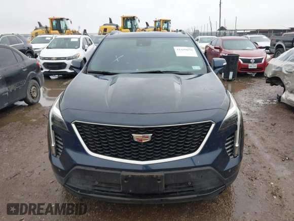 2022 Cadillac XT4 FWD Sport with VIN 1GYFZER44NF151862, listed as a IAAI auction lot 41429850 with 9,854 mi miles. Bid and sale history available at carsss.com. Image 12.
