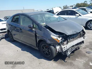 2012 Toyota Prius One z VIN JTDKN3DU1C1523891, wystawiony jako IAAI lot #42372948 z przebiegiem 219 017 mil mil oraz . Historia ofert i sprzedaży dostępna na DreamBid. Obrazek 1.