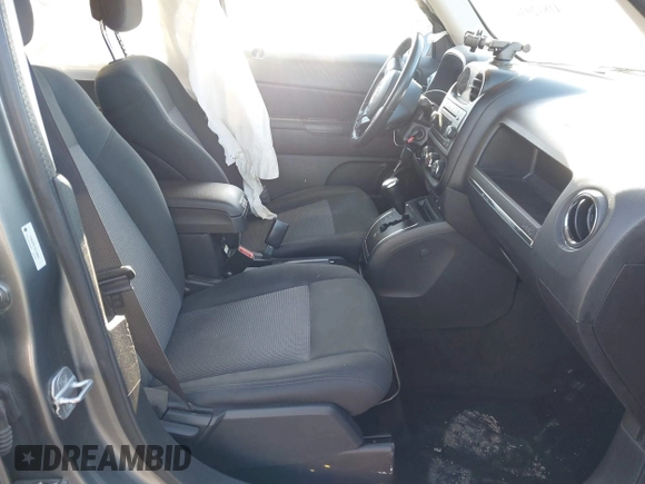 2013 Jeep Patriot Latitude with VIN 1C4NJPFA1DD169521, listed as a IAAI auction lot 41812936 with 133,088 mi miles. Bid and sale history available at carsss.com. Image 5.