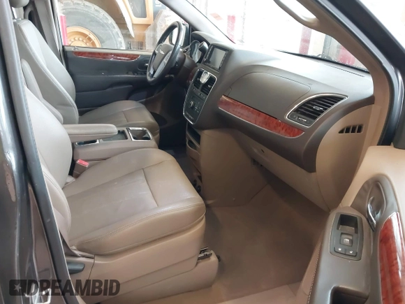 2016 Chrysler Town & Country Touring with VIN 2C4RC1BG9GR222339, listed as a IAAI auction lot 41580617 with 80,795 mi miles and . Bid and sale history available at carsss.com. Image 5.