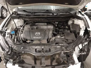 2015 Mazda CX-5 Grand Touring with VIN JM3KE4DY4F0495627, listed as a IAAI auction lot 41887773 with 130,421 mi miles. Bid and sale history available at carsss.com. Image 10.