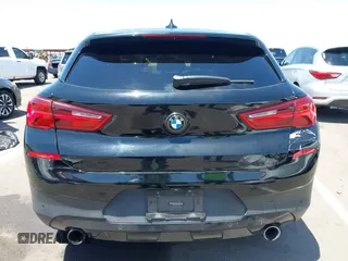 2018 BMW X2 sDrive28i with VIN WBXYJ3C35JEJ82700, listed as a IAAI auction lot 42675146 with 84,961 mi miles and . Bid and sale history available at DreamBid. Image 17.