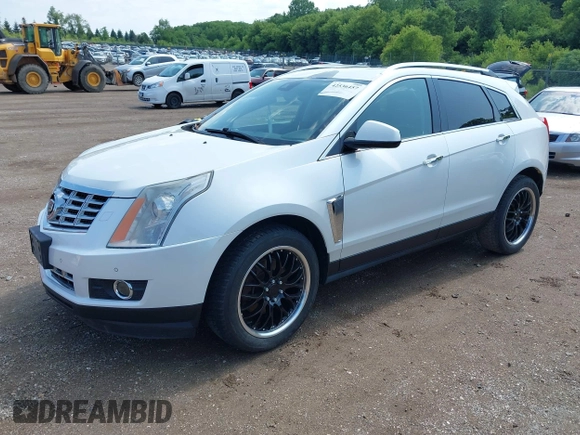 2013 Cadillac SRX Performance Collection with VIN 3GYFNHE3XDS520177, listed as a IAAI auction lot 42536457 with 217,963 mi miles and . Bid and sale history available at DreamBid. Image 2.