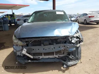 2014 Mazda 3 i Touring with VIN JM1BM1L71E1151538, listed as a IAAI auction lot 42148640 with 136,564 mi miles and . Bid and sale history available at DreamBid. Image 6.