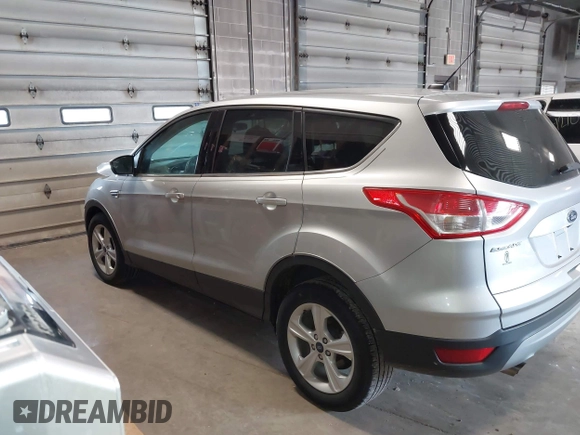 2015 Ford Escape SE with VIN 1FMCU0GX4FUC22042, listed as a IAAI auction lot 42094798 with 35,407 mi miles and . Bid and sale history available at DreamBid. Image 15.