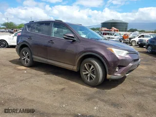 2016 Toyota RAV4 XLE with VIN 2T3RFREV8GW522847, listed as a IAAI auction lot 41682374 with 97,166 mi miles. Bid and sale history available at carsss.com. Image 1.
