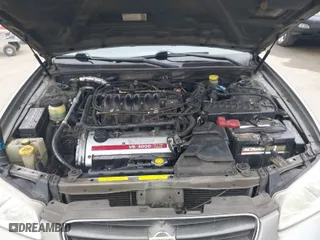 2000 Nissan Maxima GXE with VIN JN1CA31D8YT759473, listed as a IAAI auction lot 42047228 with 228,544 mi miles. Bid and sale history available at carsss.com. Image 10.