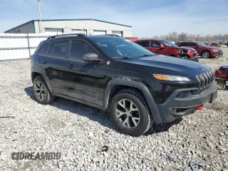 2017 Jeep Cherokee Trailhawk L Plus with VIN 1C4PJMBB5HW513075, listed as a Copart auction lot 49499425 with 136,185 mi miles and Salvage Title. Bid and sale history available at carsss.com. Image 4.