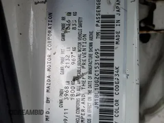 2012 Mazda 3 i Sport z VIN JM1BL1UG2C1531695, wystawiony jako Copart lot #56307725 z przebiegiem 104 537 mil mil oraz Szkoda całkowita • Salvage title. Historia ofert i sprzedaży dostępna na DreamBid. Obrazek 12.