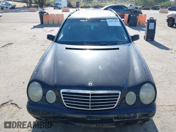 2001 Mercedes-Benz E-Class with VIN WDBJH65J31B381879, listed as a IAAI auction lot 41855504 with 153,667 mi miles. Bid and sale history available at carsss.com. Image 6.