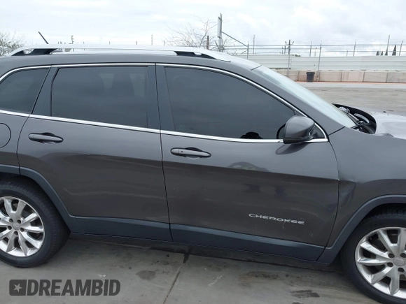 2014 Jeep Cherokee Limited with VIN 1C4PJLDS9EW241875, listed as a IAAI auction lot 42062856 with 90,052 mi miles and . Bid and sale history available at DreamBid. Image 13.