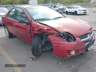 2004 Dodge Neon SXT with VIN 1B3ES56C04D504384, listed as a IAAI auction lot 41988581 with 166,602 mi miles. Bid and sale history available at carsss.com. Image 1.